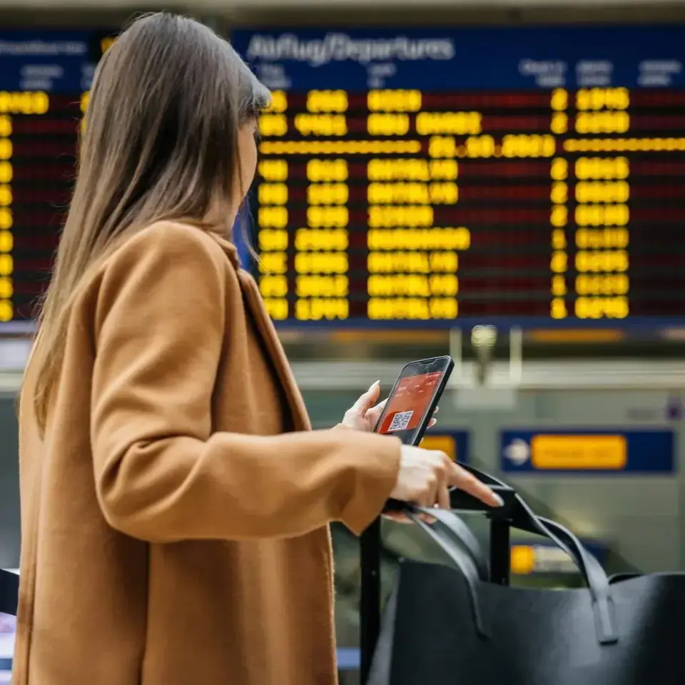Person at airport with digital ticket